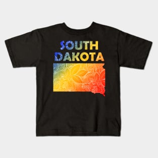 Colorful mandala art map of South Dakota with text in blue, yellow, and red Kids T-Shirt